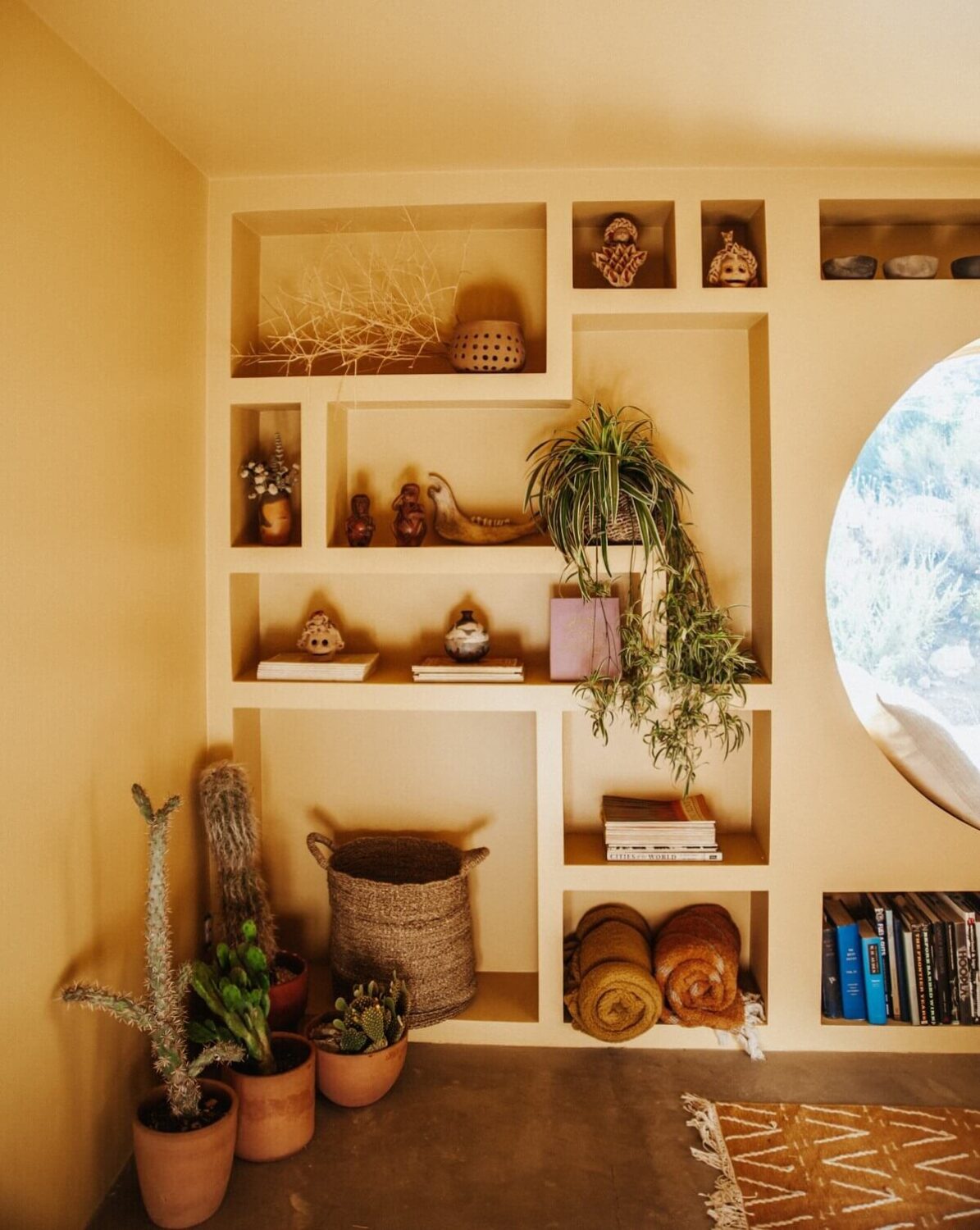 A Colorful Airbnb Home in the Morongo Valley 18 custom-shelves-yellow-bedroom-nordroom