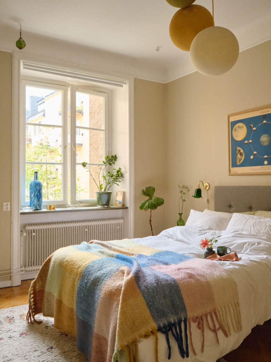 A Beautiful Color Palette and Historic Elements in a Stockholm Apartment 21 dark beige bedroom
