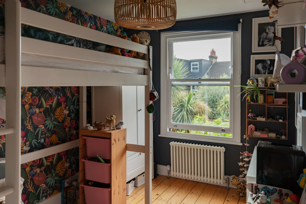 Exposed Brick and Wooden Beams in an Extended London Home 28 dark blue kids bedroom colorful wallpaper