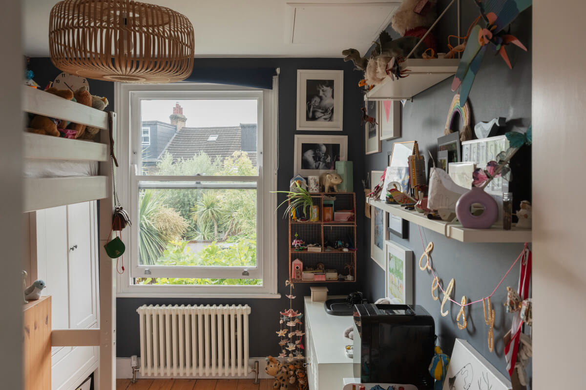 Exposed Brick and Wooden Beams in an Extended London Home 27 dark blue kids bedroom