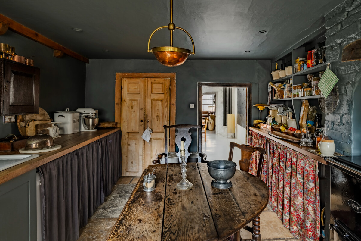 dark blue kitchen rustic wooden table open shelves