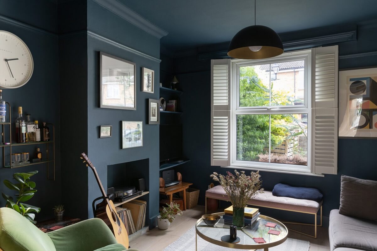 A London Family Home with a Light Modern Extension 14 dark blue living room shutters fireplace nordroom
