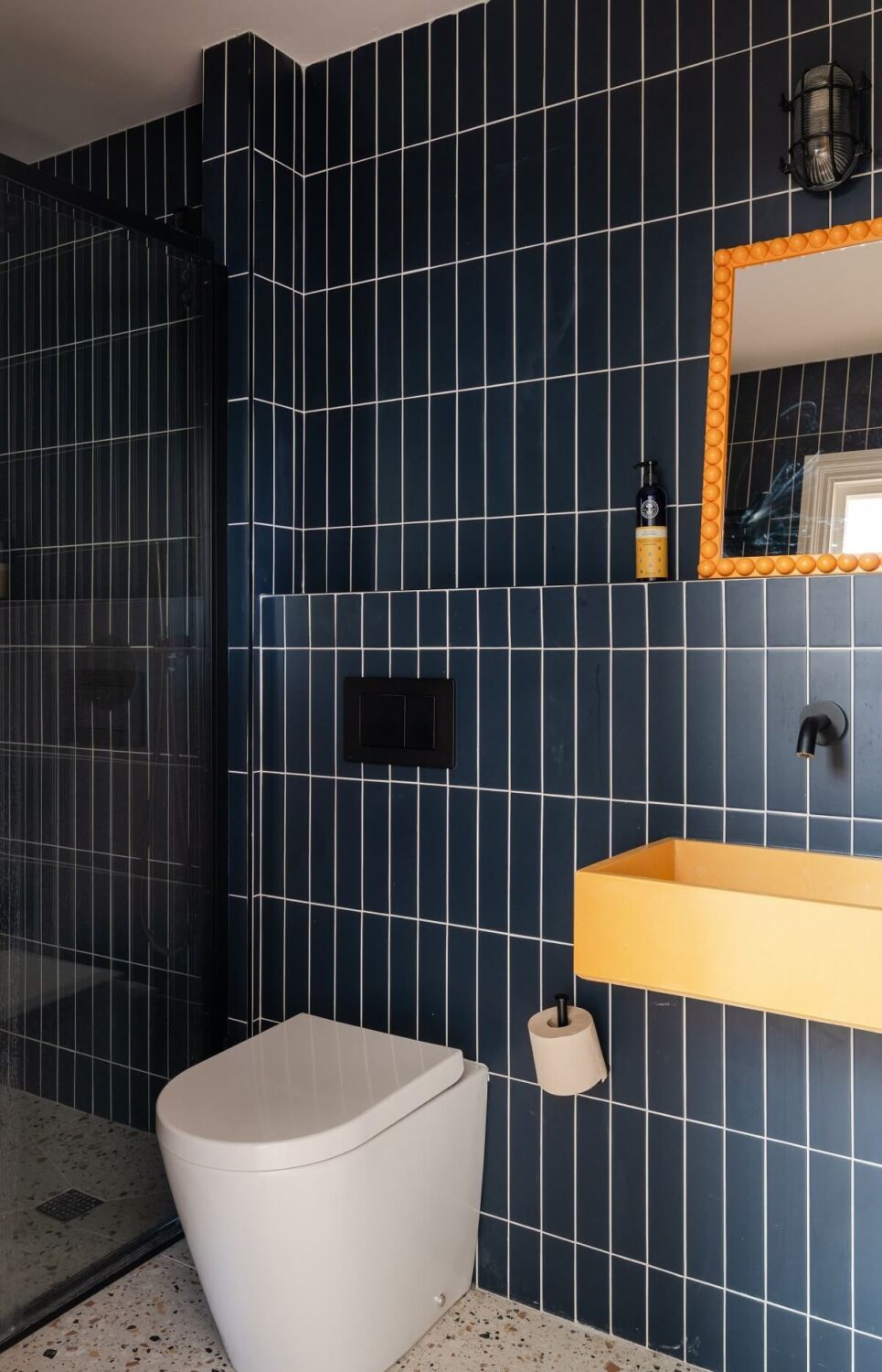 Moody, not Gloomy! Beautiful Dark Small Bathrooms 8 dark blue tiles small bathroom nordroom