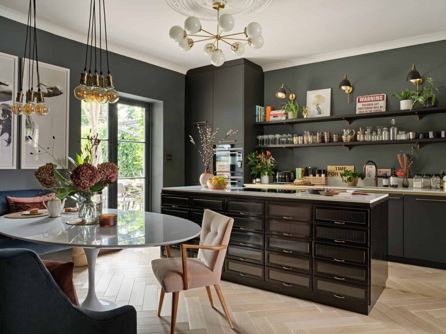 Pink & Gray Rooms in a Victorian Home with a Guest House 6 dark gray kitchen with island and shelves