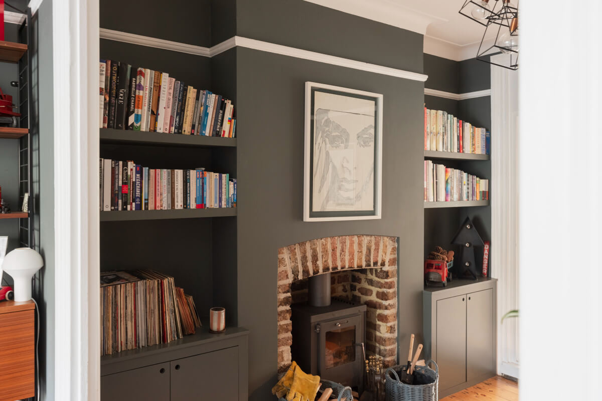 Exposed Brick and Wooden Beams in an Extended London Home 5 dark gray living room brick fireplace built-in bookshelves