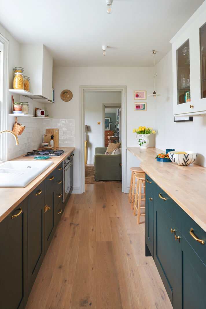 The Pros and Cons of a Wooden Kitchen Countertop 8 dark green kitchen