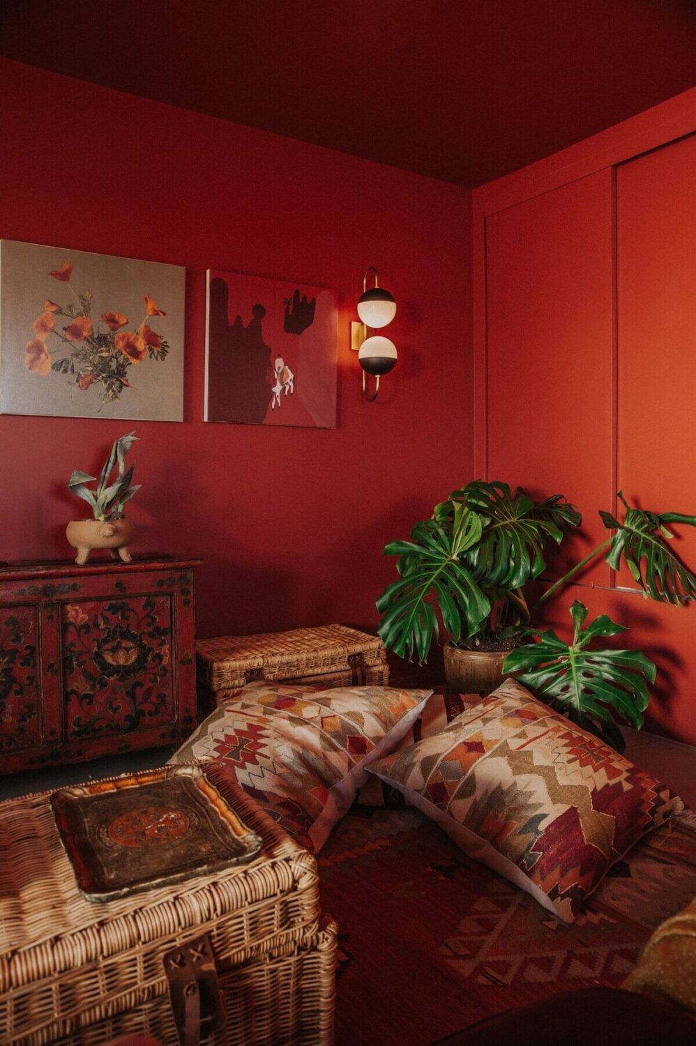 A Colorful Airbnb Home in the Morongo Valley 5 deep-red-living-room-floor-pillows-nordroom