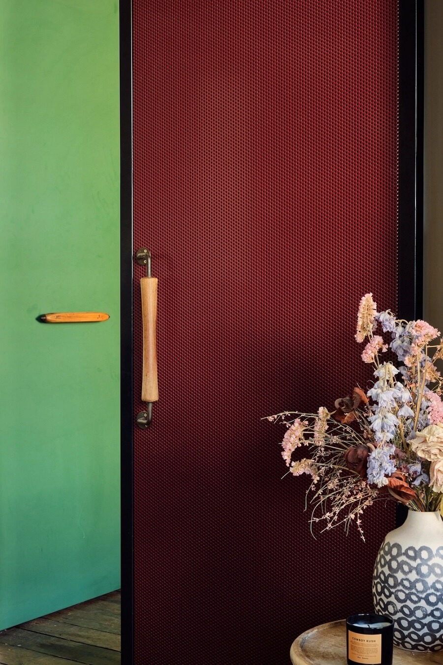The Color Trends for 2025: Warm, Natural Shades and a Cheerful Accent 52 deep-red-sliding-door-industrial-apartment-nordroom