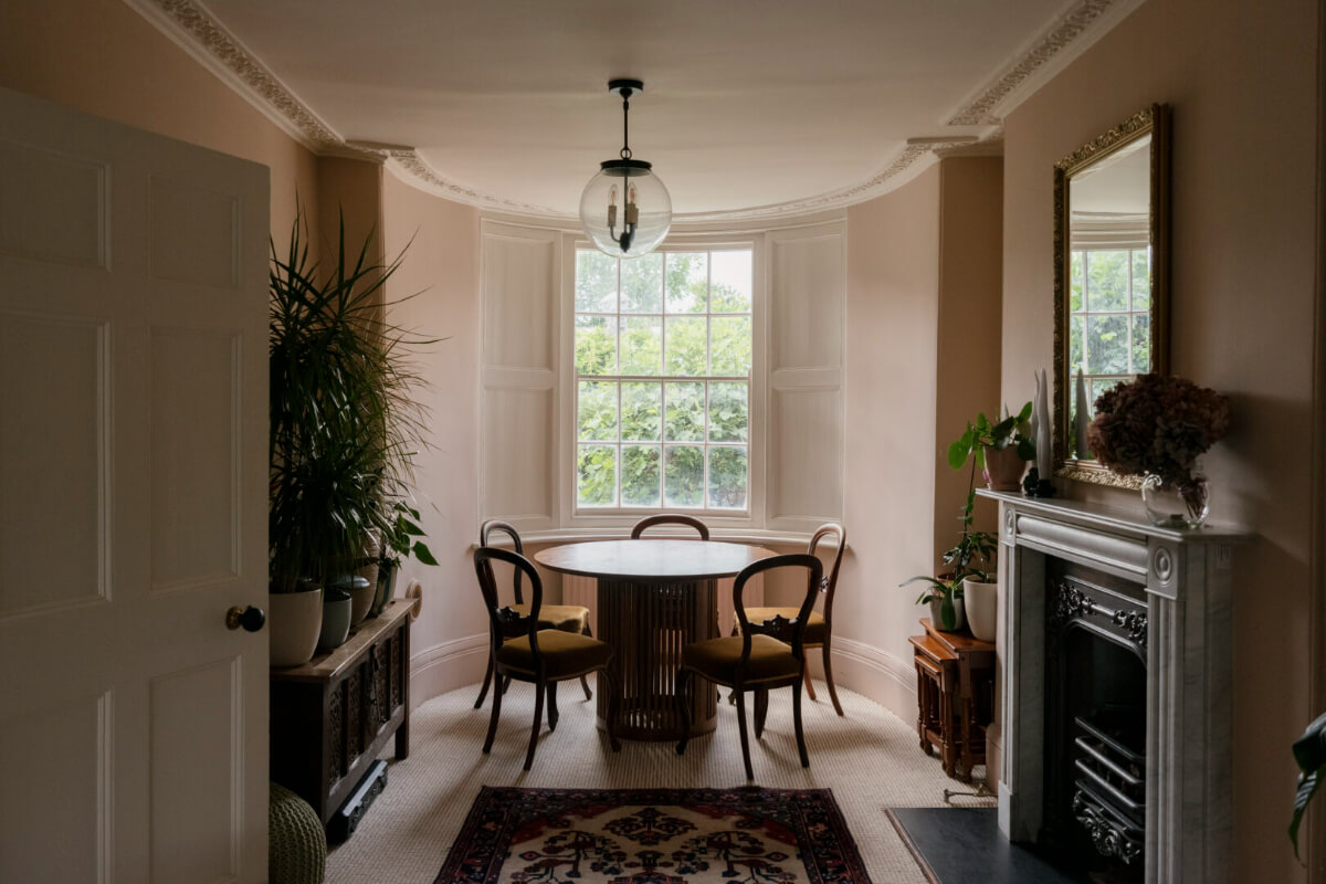 A Classic Georgian House in London with a Lush Garden 1 dining room pink walls bay window