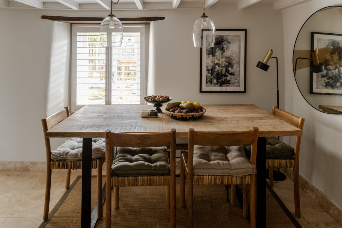 A Charming Stone Cottage with Period Features in Cornwall 8 dining room round mirror low ceiling