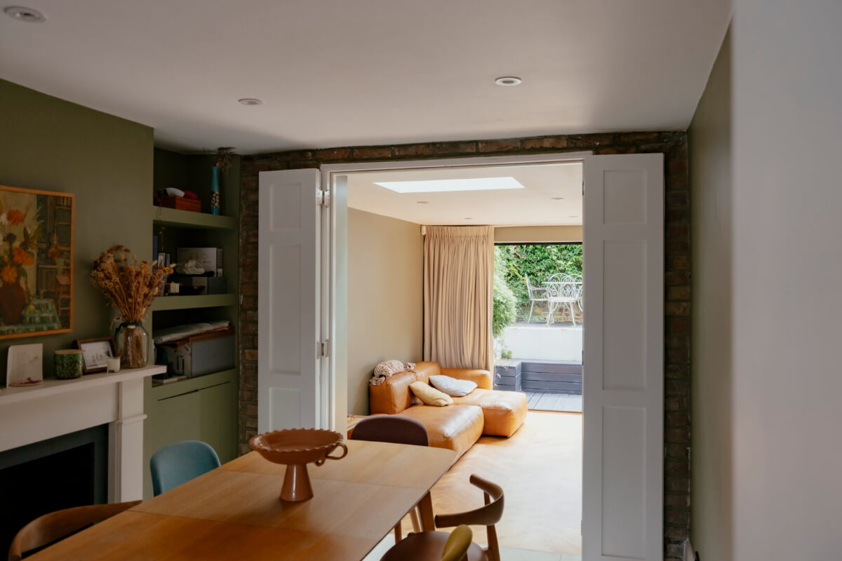 A Renovated Victorian Townhouse with a Small Split-Level Garden 13 dining room with fireplace