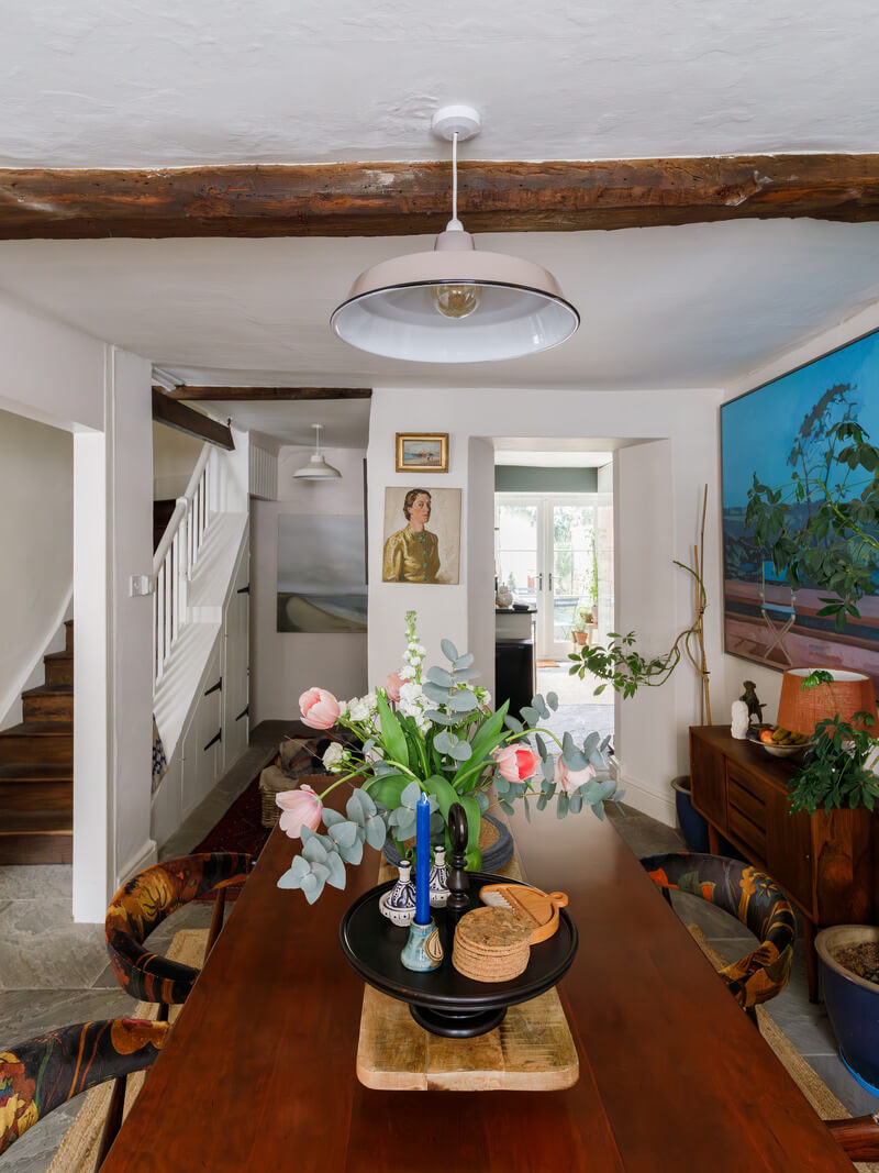 dining room with wooden beam