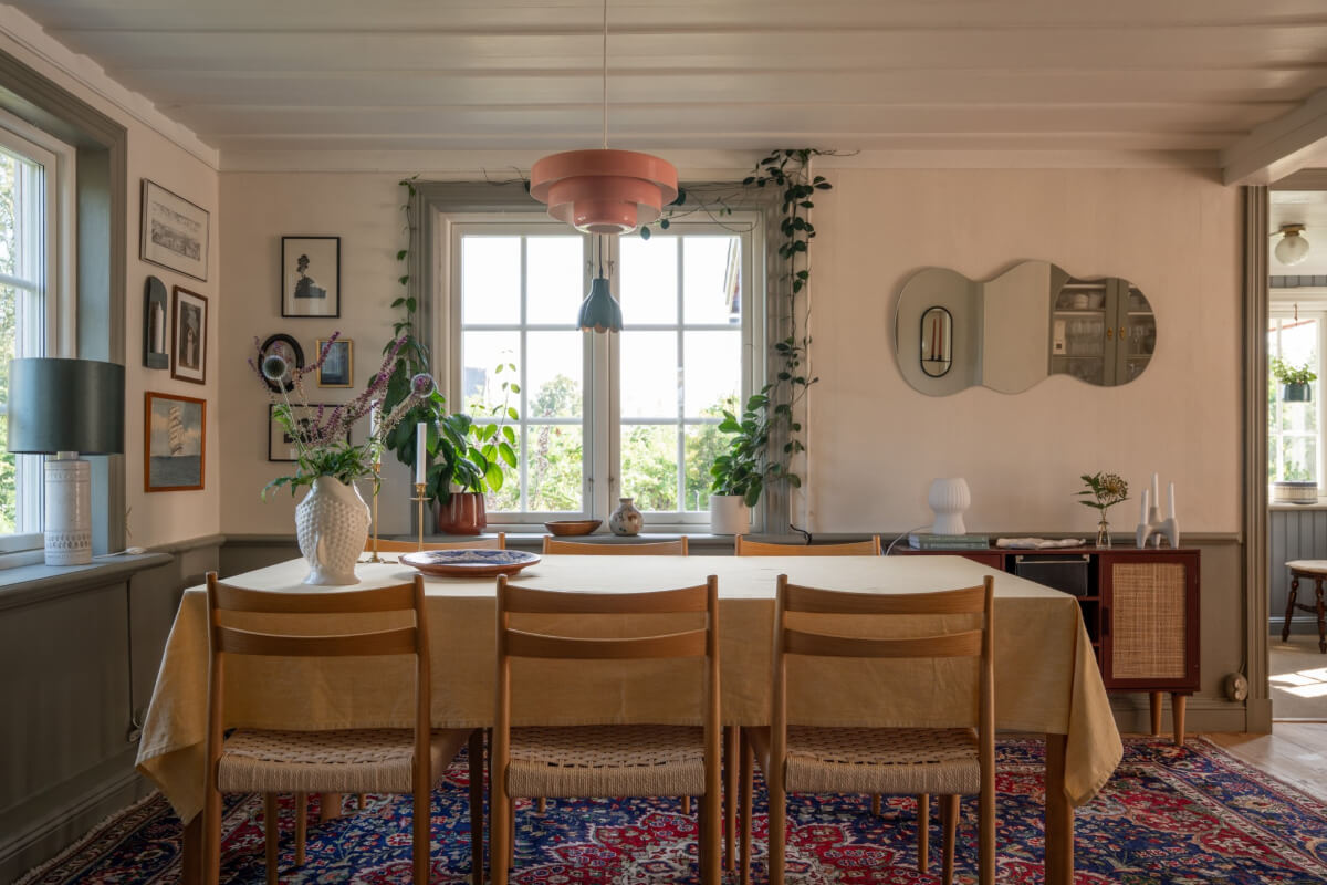 A Charming Historic Country House North of Stockholm 13 dining table corner windows