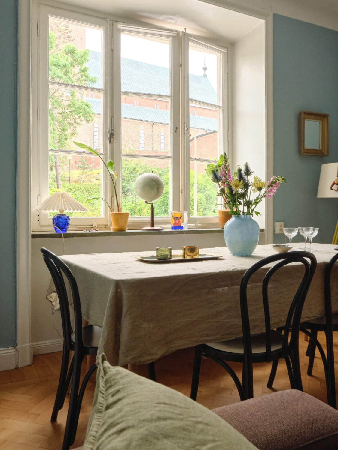 A Beautiful Color Palette and Historic Elements in a Stockholm Apartment 10 dining table detail