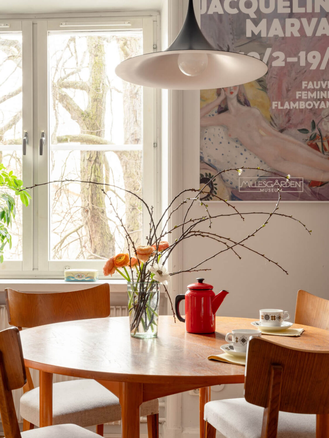 A Light Corner Apartment with a Pale Yellow Kitchen 5 dining table detail