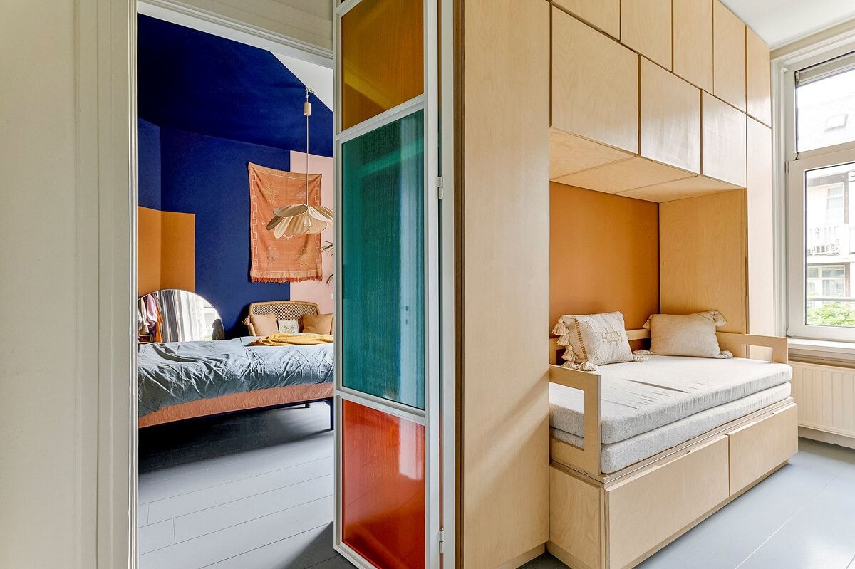 An Amsterdam Apartment with Surprising Bold Color Accents 14 double bedrooms with glass colorful doors