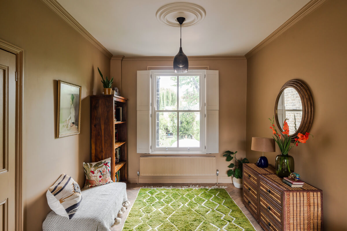 A Victorian Home with a Rich Color Palette and a Beautiful Garden 3 double living room