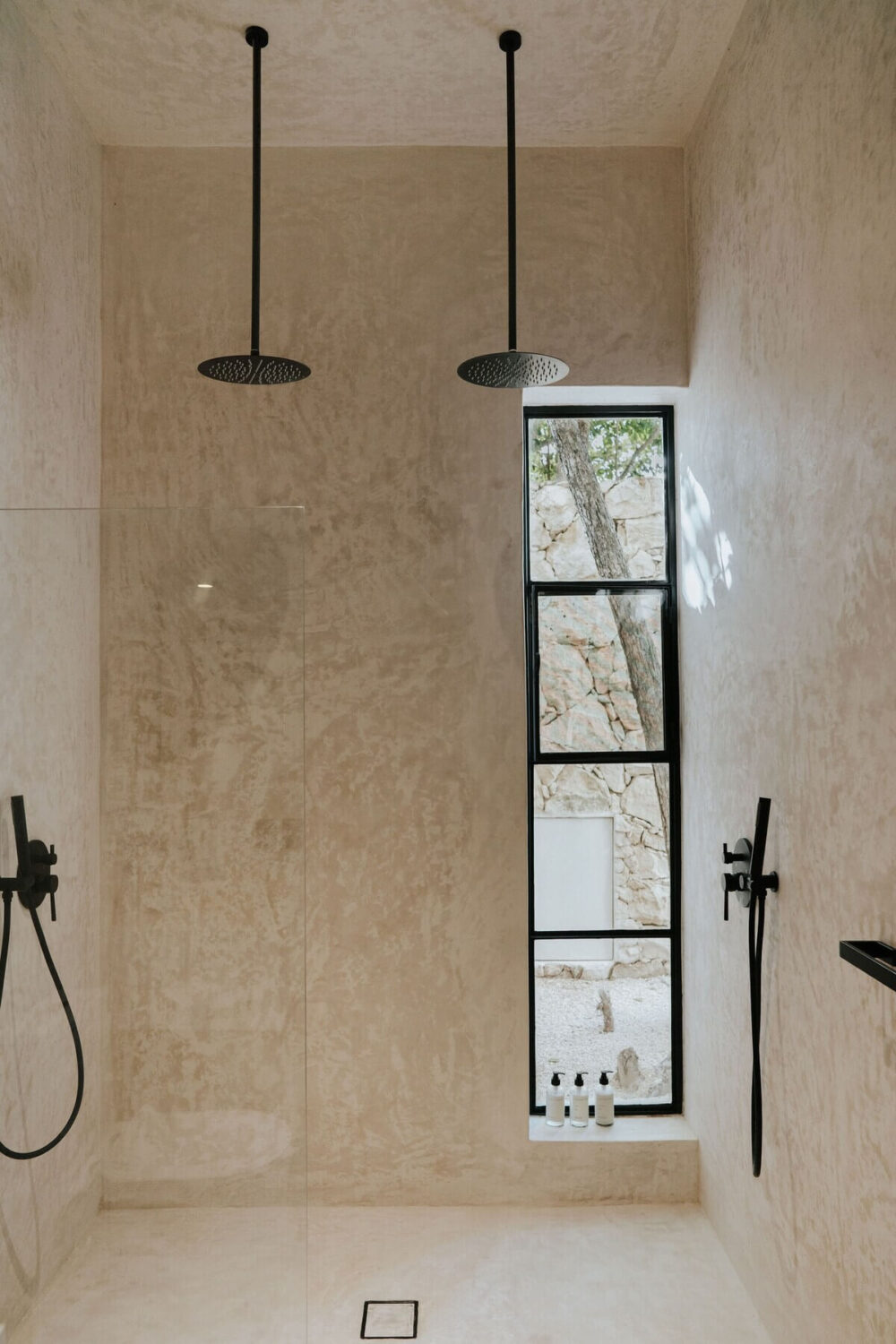 A Serene Design Apartment in Tulum 26 double-walk-in-shower-black-fittings-nordroom