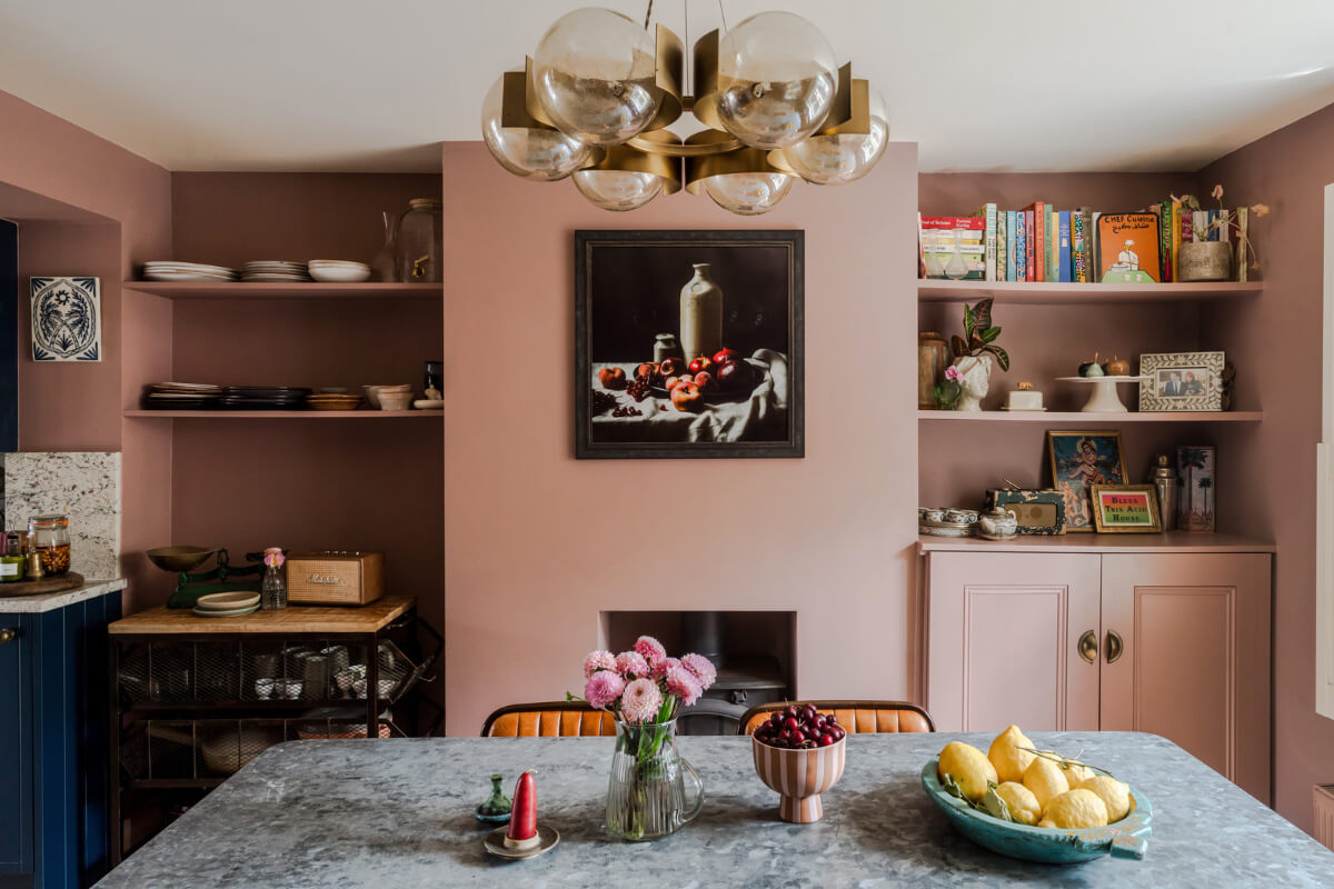 A Victorian Home with a Rich Color Palette and a Beautiful Garden 10 earthy pink dining room built-in shelves