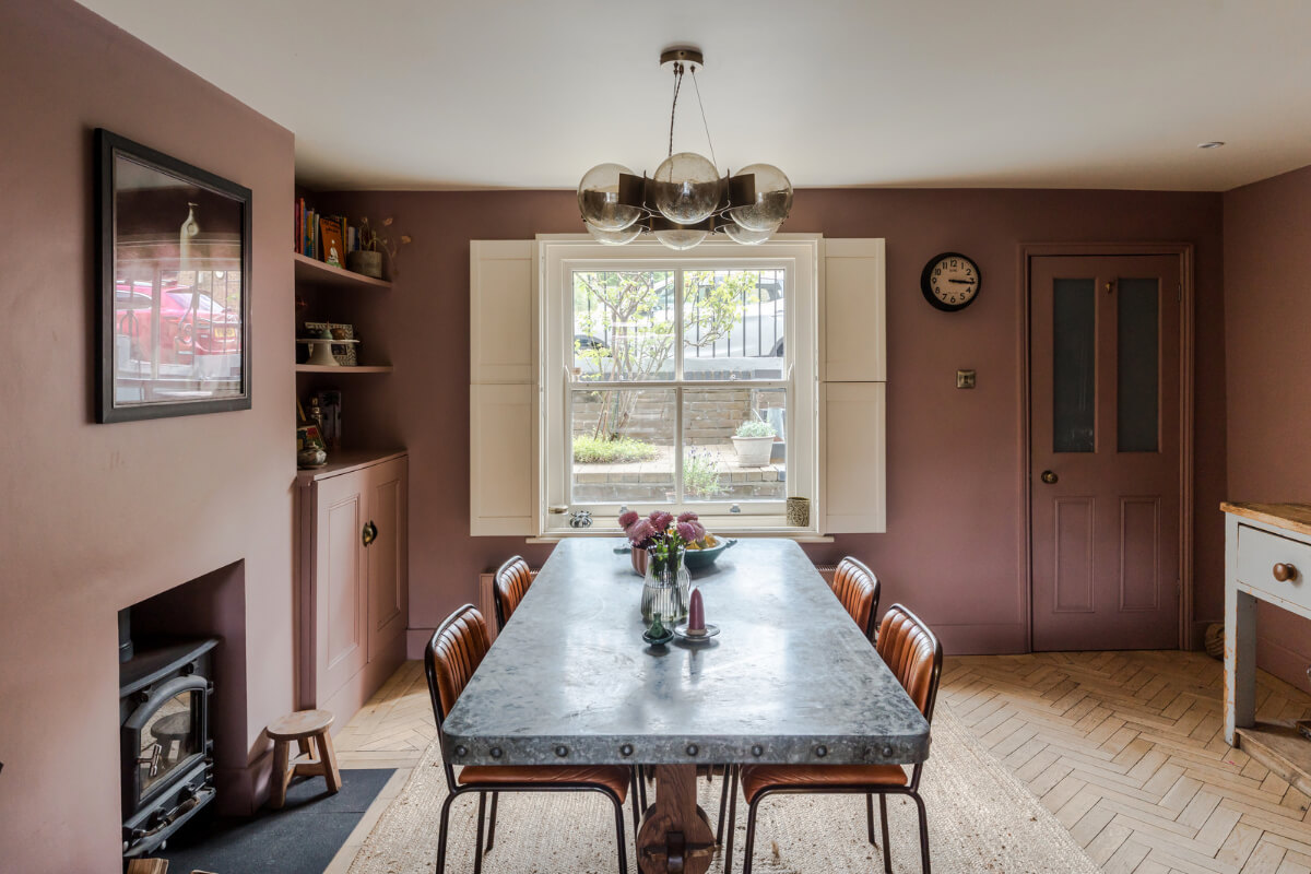 A Victorian Home with a Rich Color Palette and a Beautiful Garden 9 earthy pink dining room