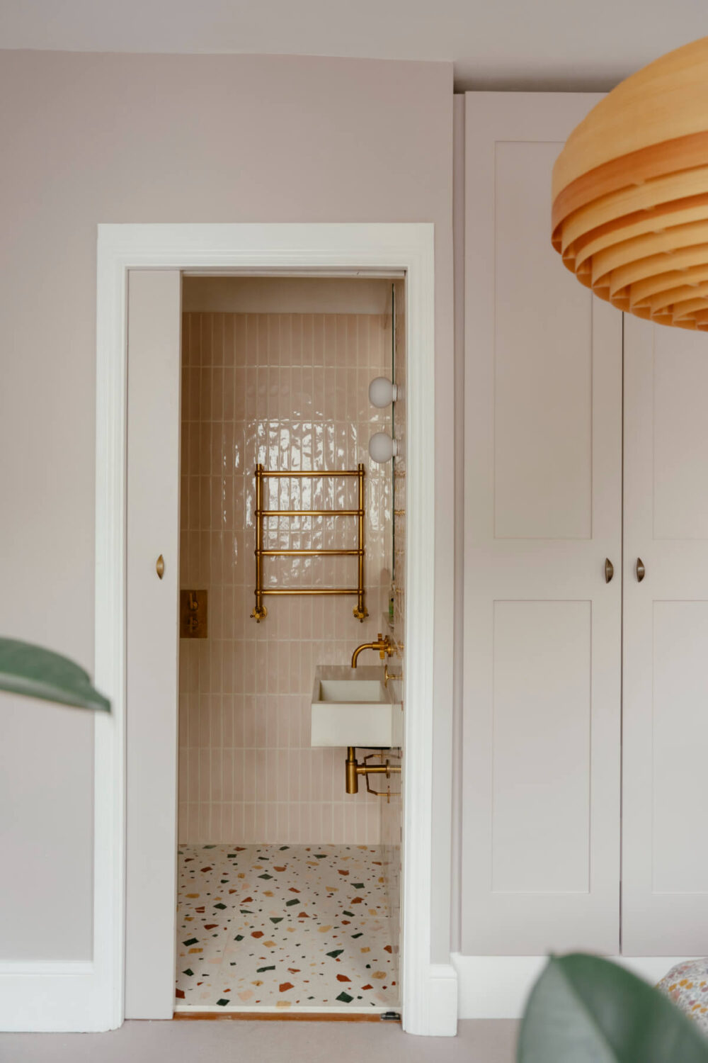 A Renovated Victorian Townhouse with a Small Split-Level Garden 23 en-suite bathroom terrazzo floor tiles