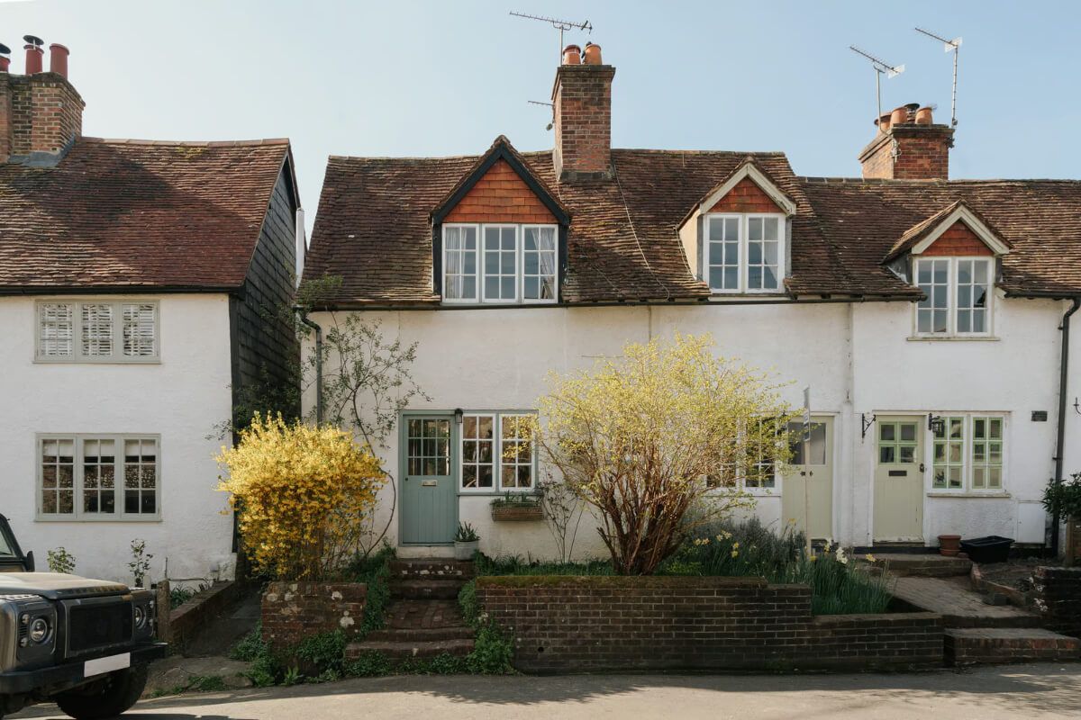 A Historic English Cottage Decorated in Pink & Blue Tones 22 exterior historic english cottage
