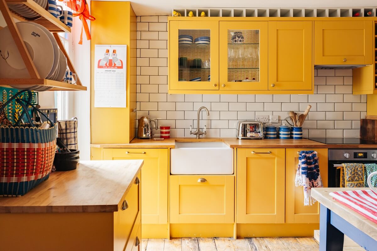 Yellow Kitchen Design Ideas (with Paint Colors) 2 farrow-ball-india-yellow-kitchen-cabinets-maximalist-home-london-nordroom