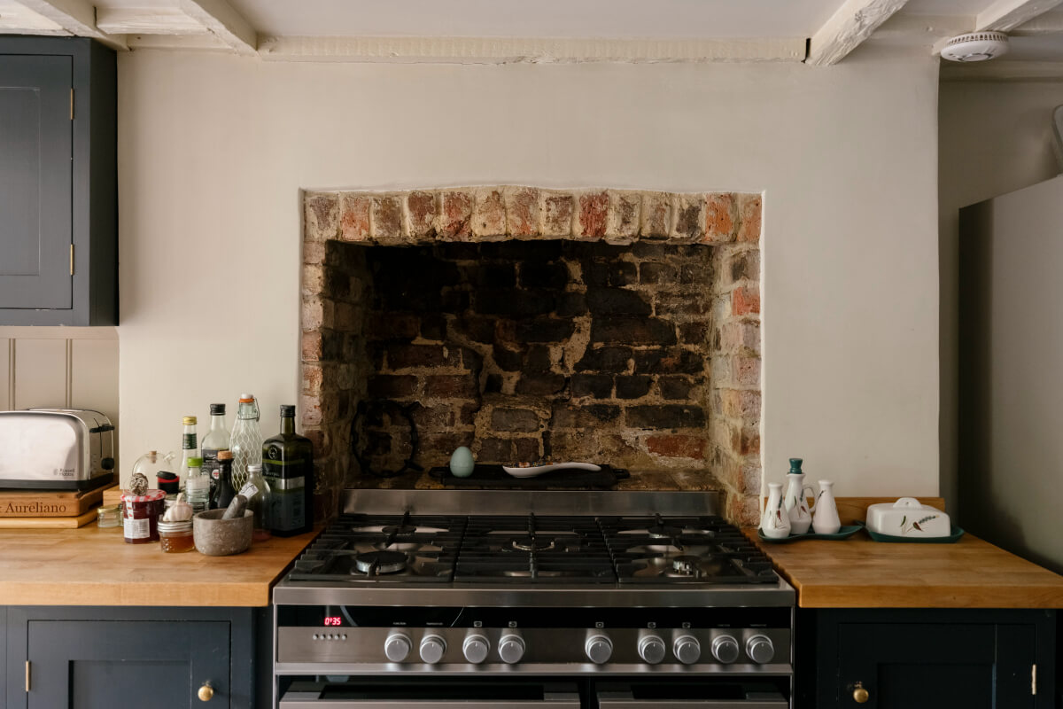A Classic Georgian House in London with a Lush Garden 14 former fireplace kitchen