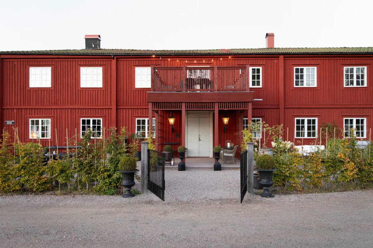 An Open-Plan Gray Home in a Former Textile Factory 26 front door red factory conversion sweden An Open-Plan Gray Home in a Former Textile Factory