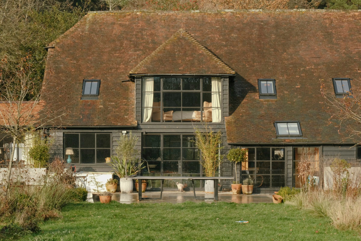 A Barn House with Vintage Decor and Exposed Beams 39 garden barn house england