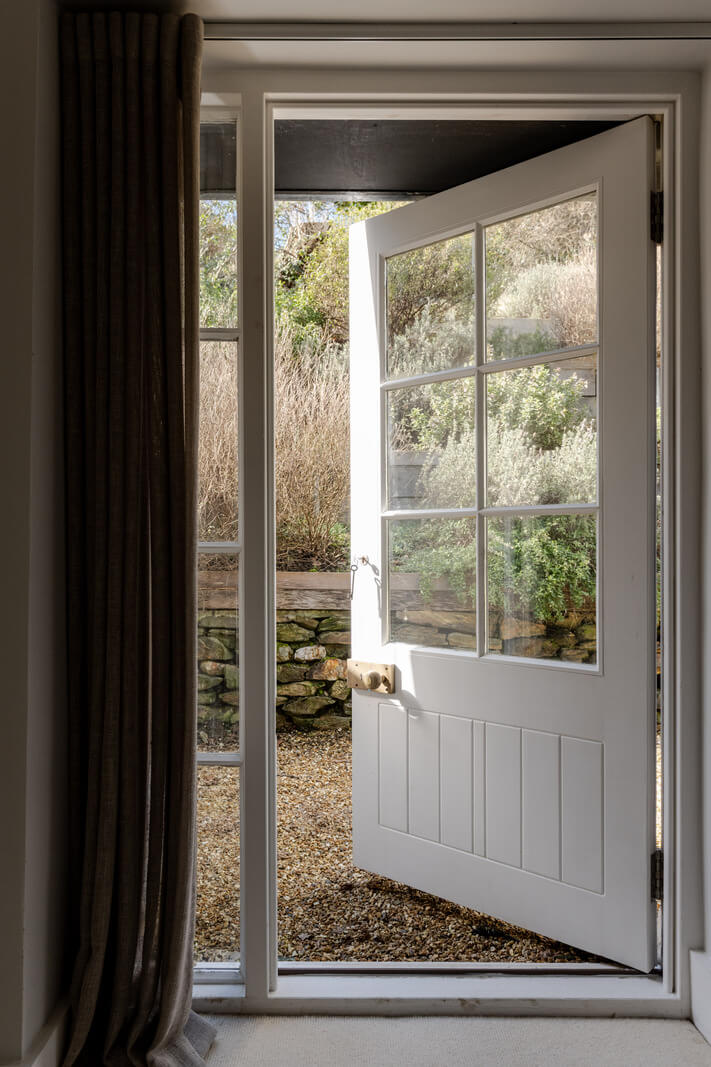 A Charming Stone Cottage with Period Features in Cornwall 21 garden door