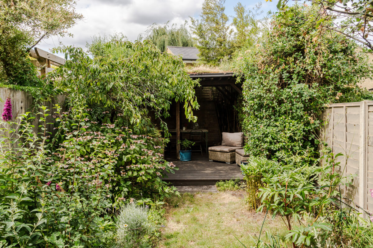 A Victorian Home with a Rich Color Palette and a Beautiful Garden 25 garden seating