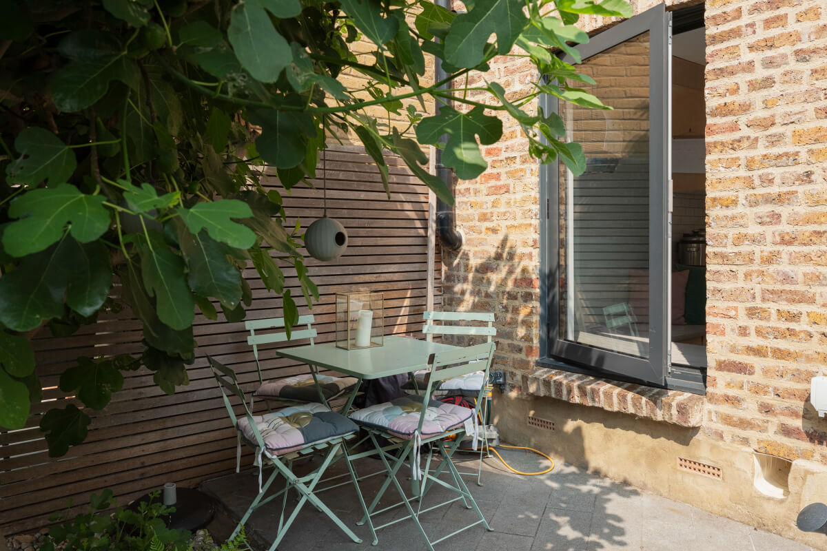 Exposed Brick and Wooden Beams in an Extended London Home 19 garden terrace