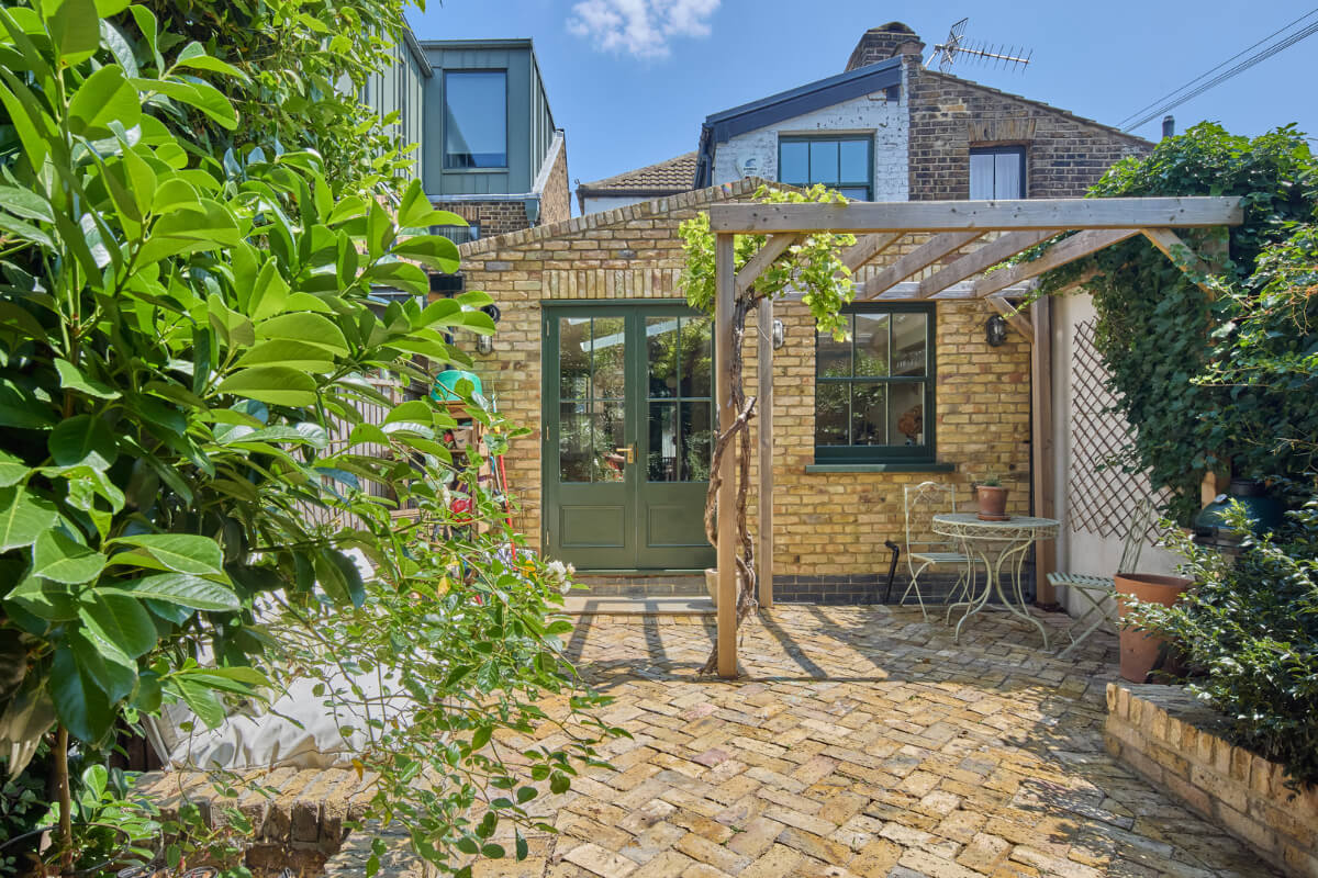 A 19th Century London Cottage with a Stunning Kitchen Extension 27 garden with pergola