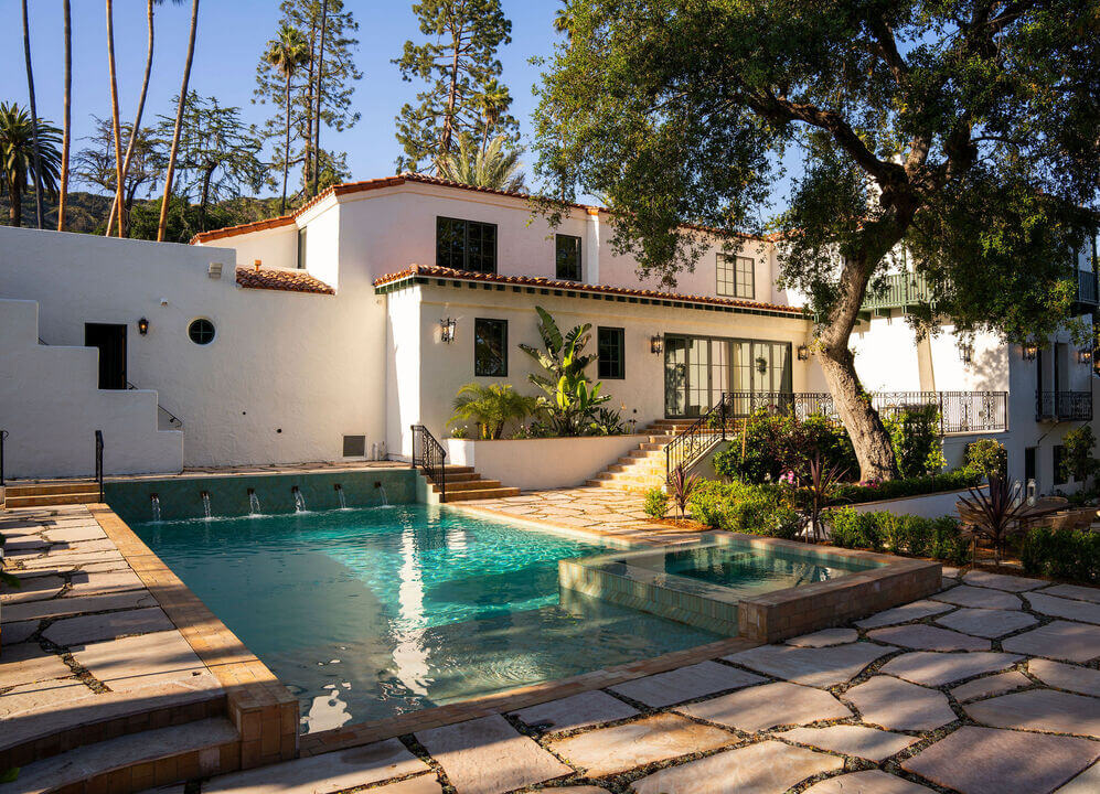 A Reimagined Spanish Colonial Revival Estate in Los Angeles 20 garden with pool