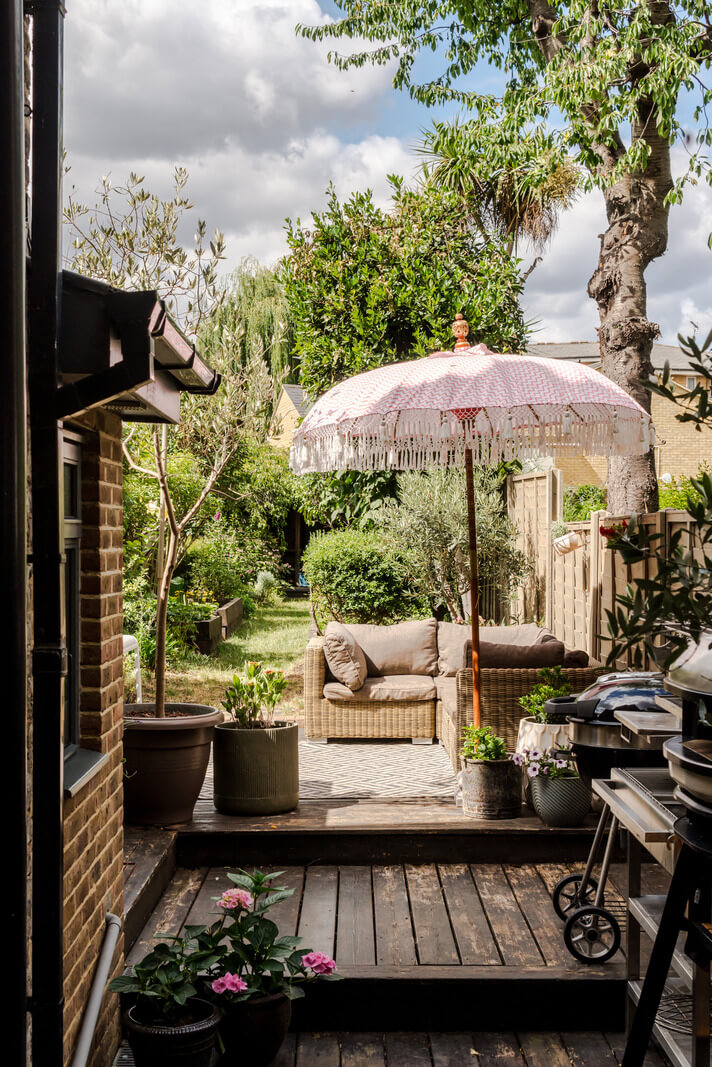 A Victorian Home with a Rich Color Palette and a Beautiful Garden 22 garden wooden terrace