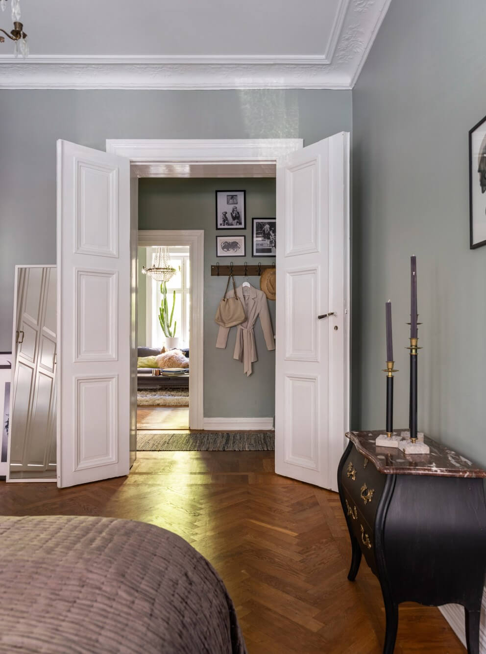 Classic Proportions and a Charming Kitchen in a Malmö Apartment 13 gray bedroom stucco parquet floor