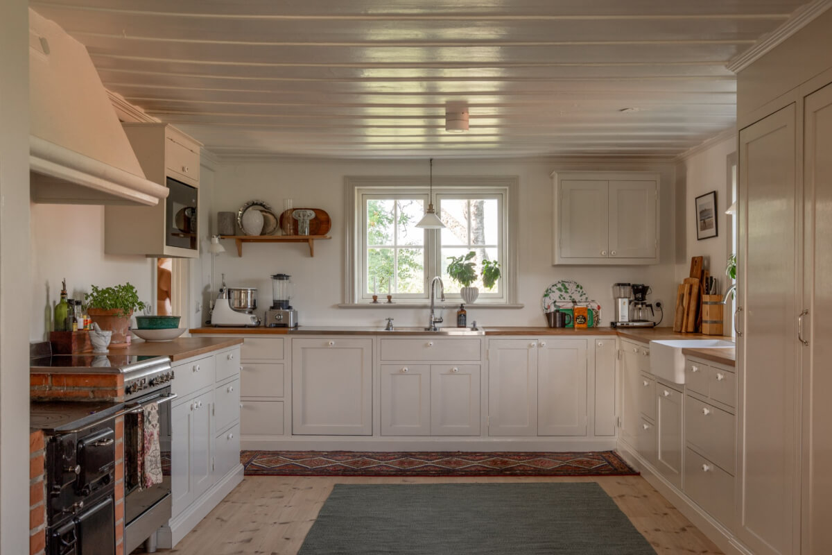A Charming Historic Country House North of Stockholm 17 gray country kitchen wooden countertop
