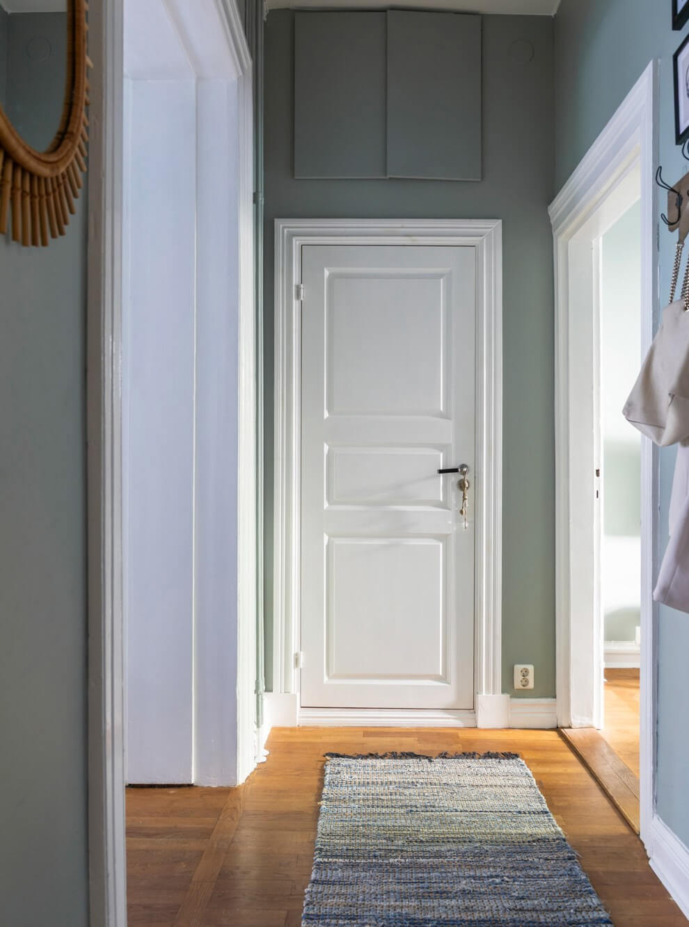Classic Proportions and a Charming Kitchen in a Malmö Apartment 16 gray hall
