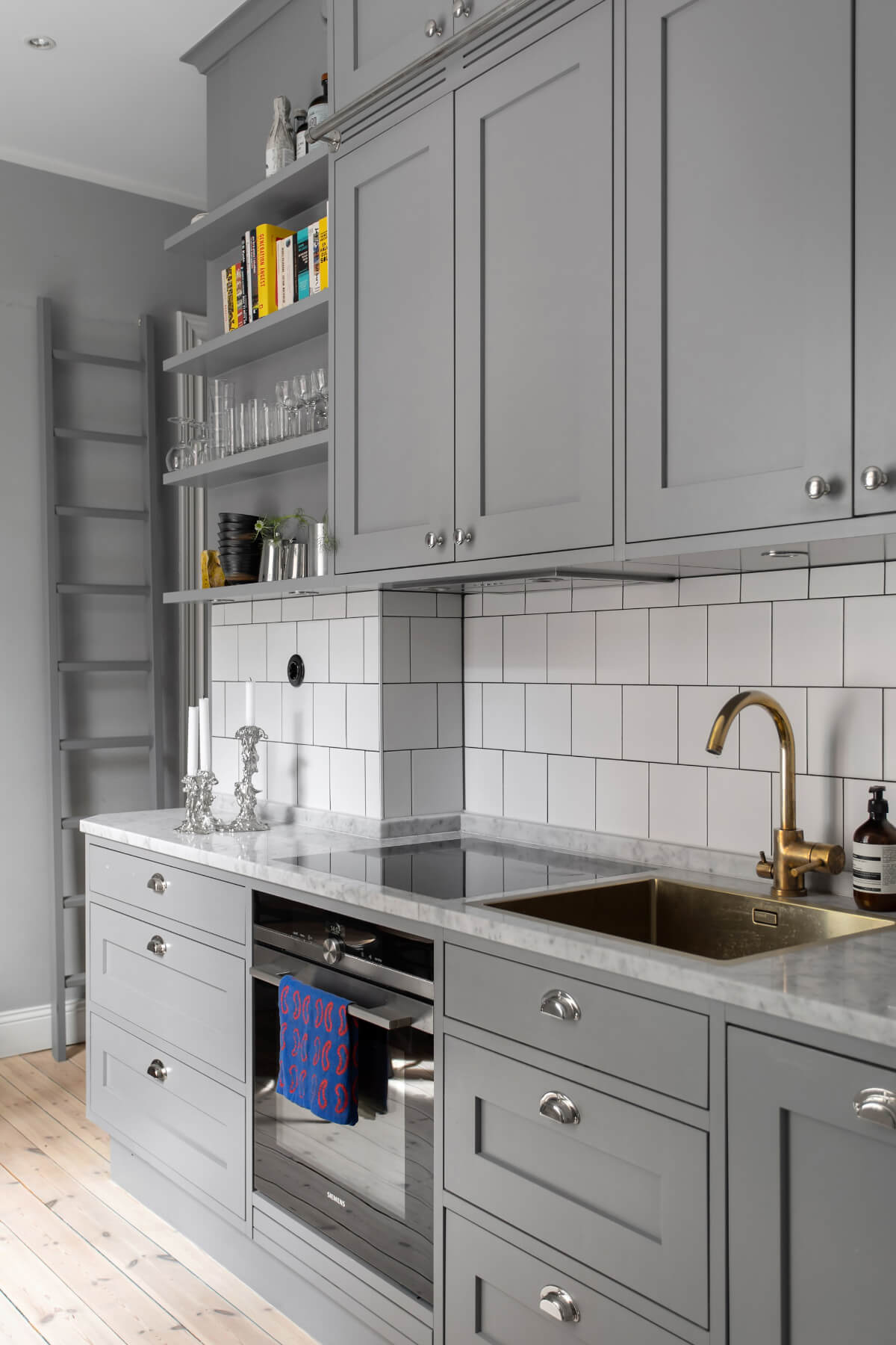 gray kitchen double row upper cabinets shelves
