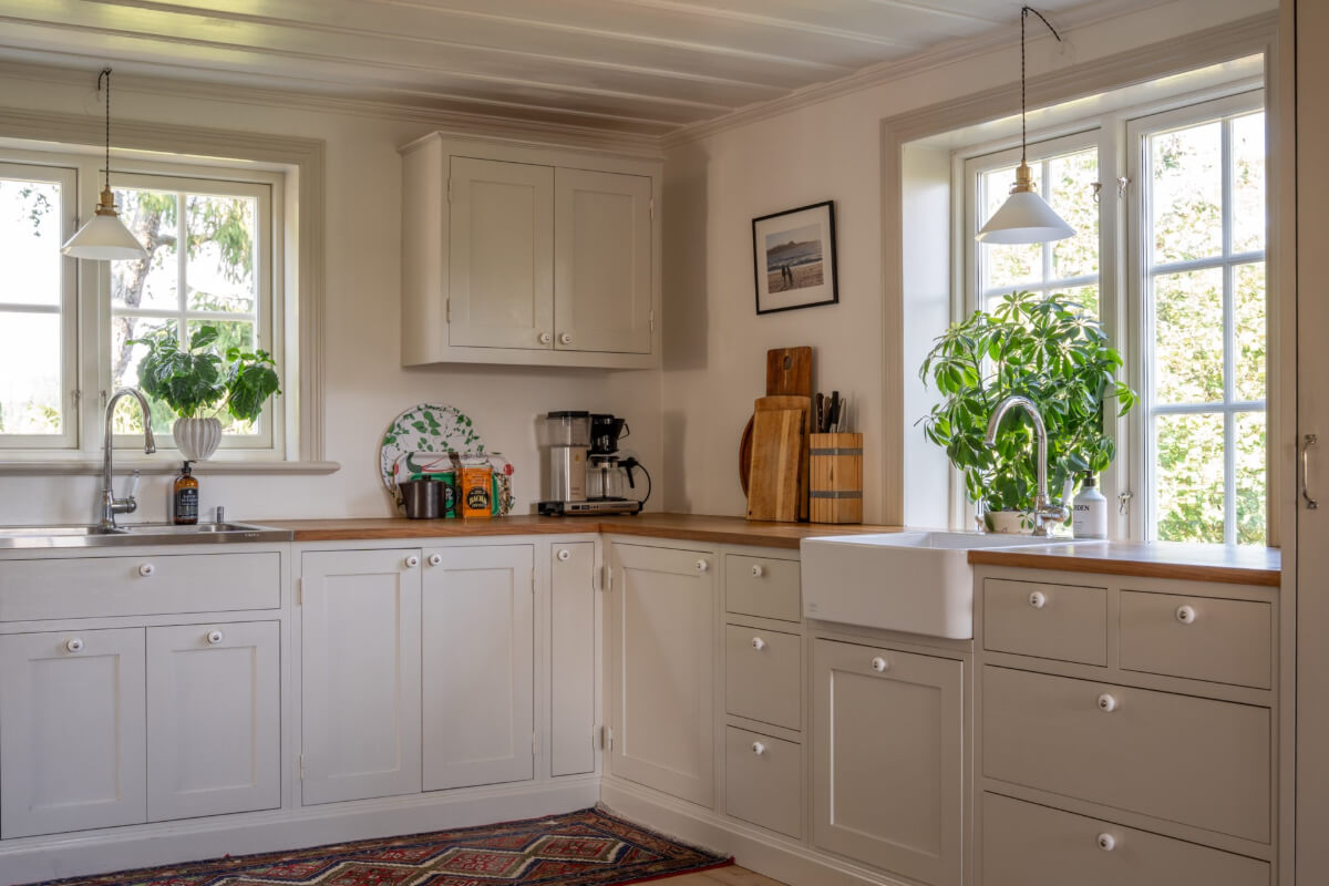 A Charming Historic Country House North of Stockholm 18 gray kitchen with butler sink