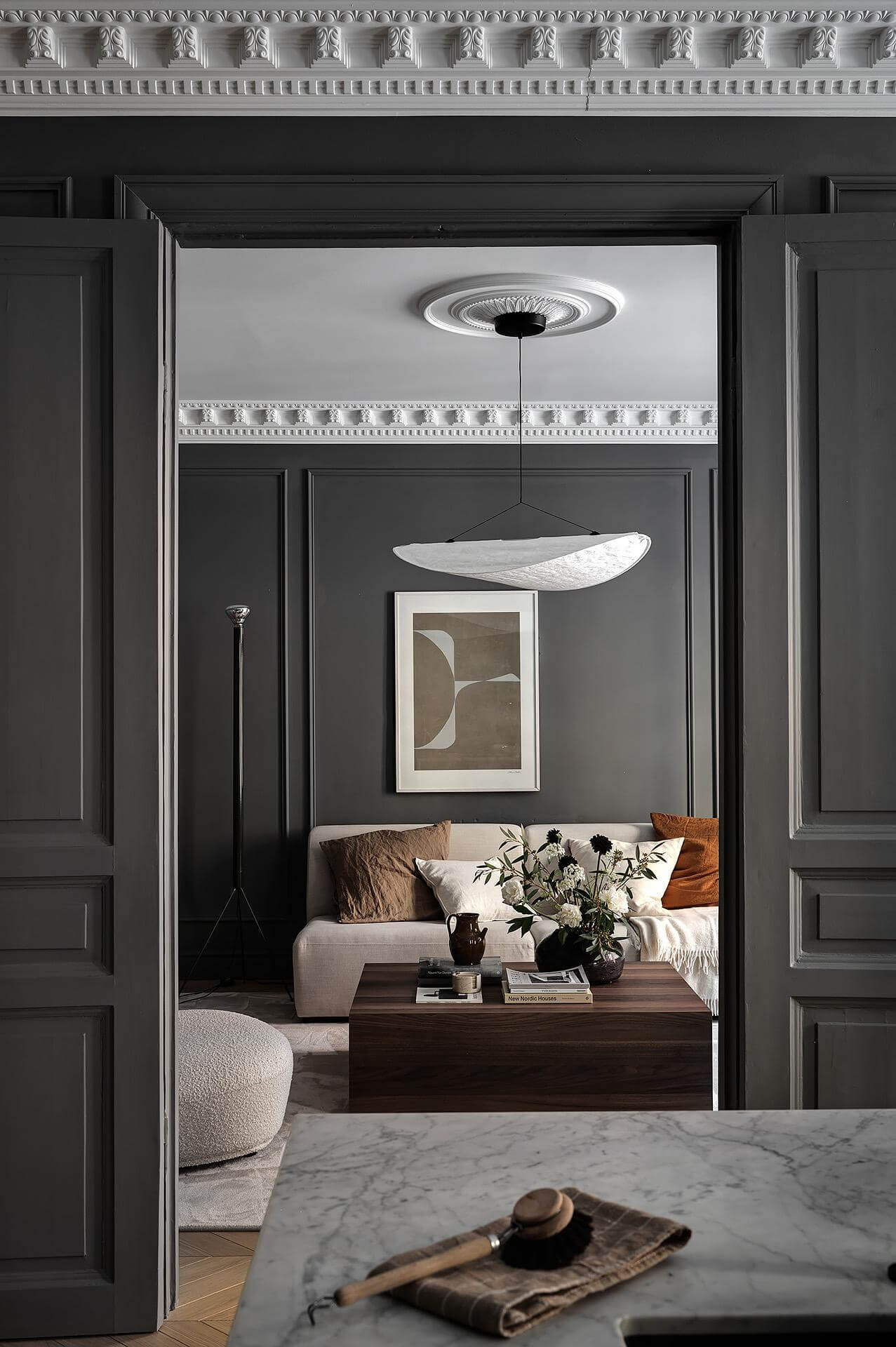 gray living room double wooden doors