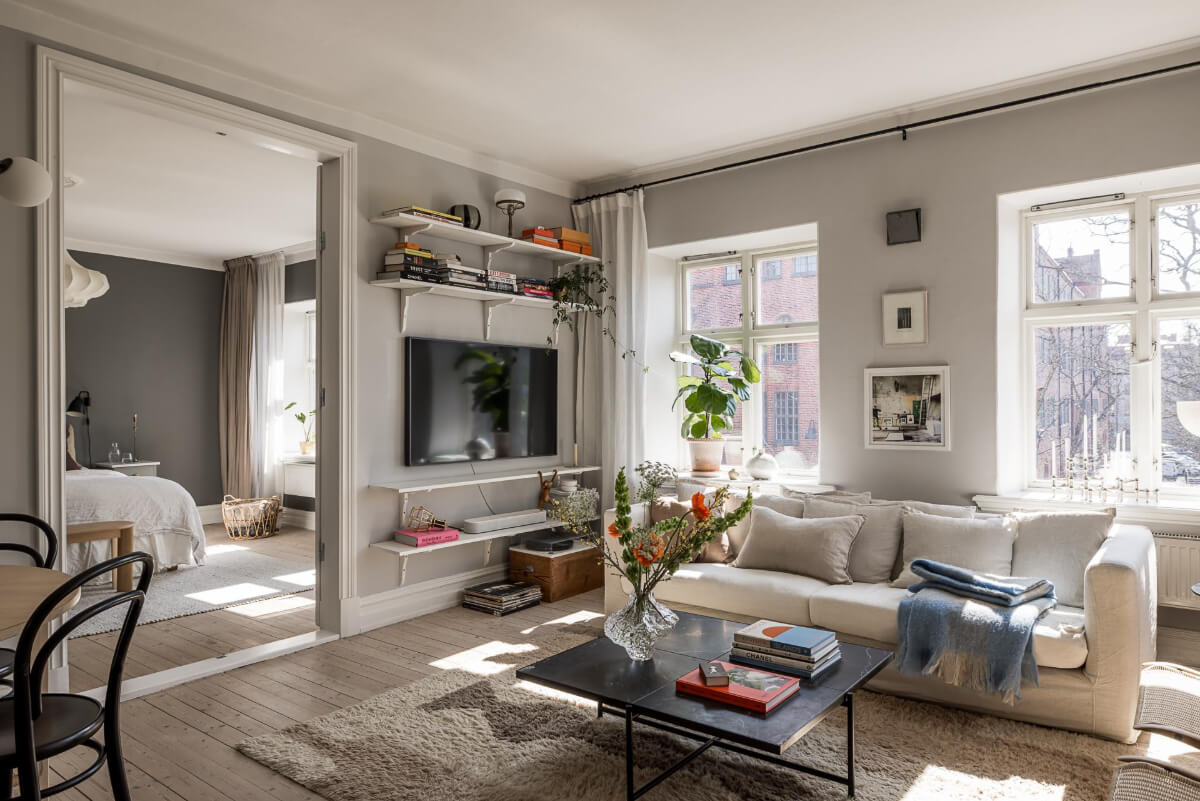 gray living room large windows