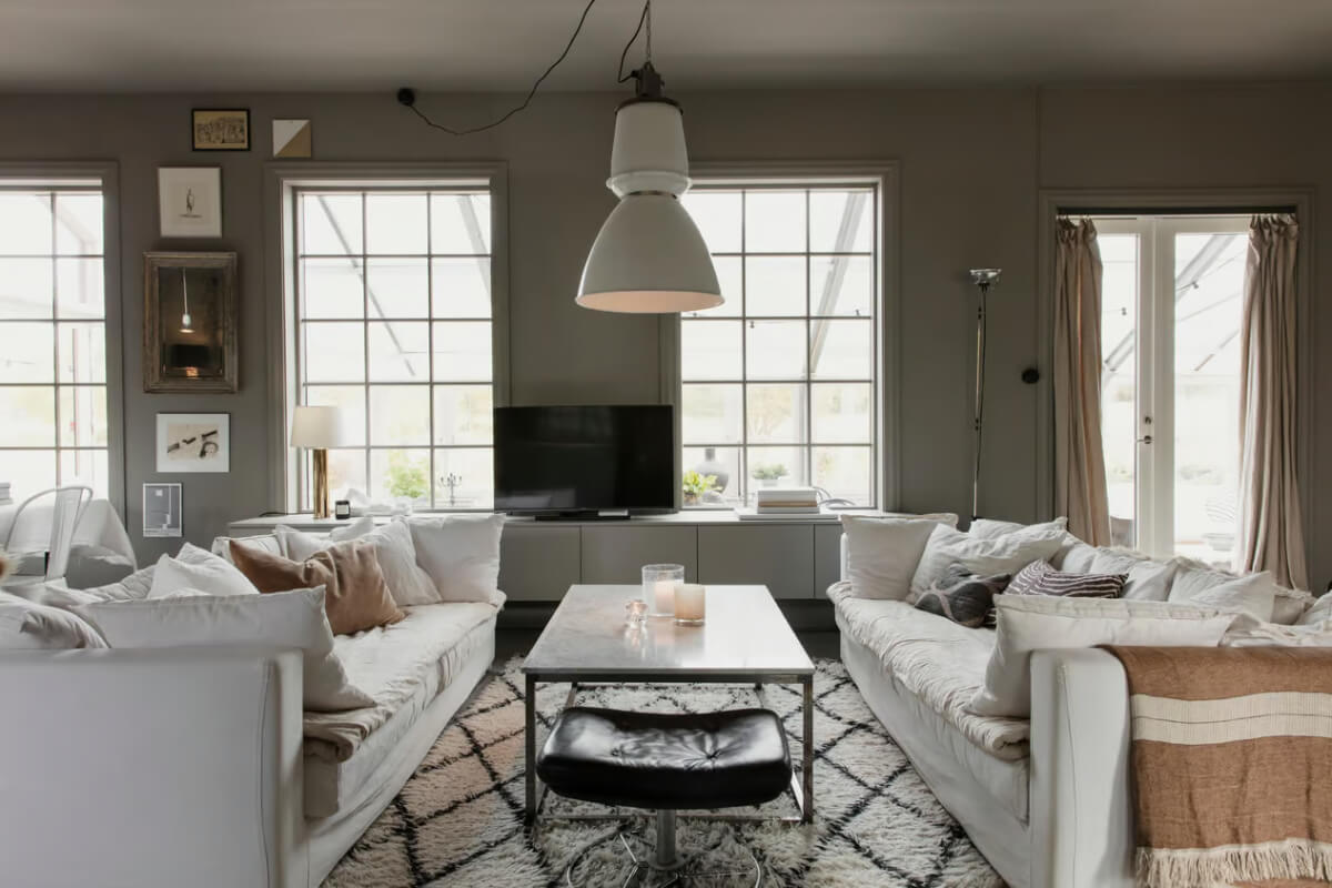 An Open-Plan Gray Home in a Former Textile Factory 2 gray living room white sofa