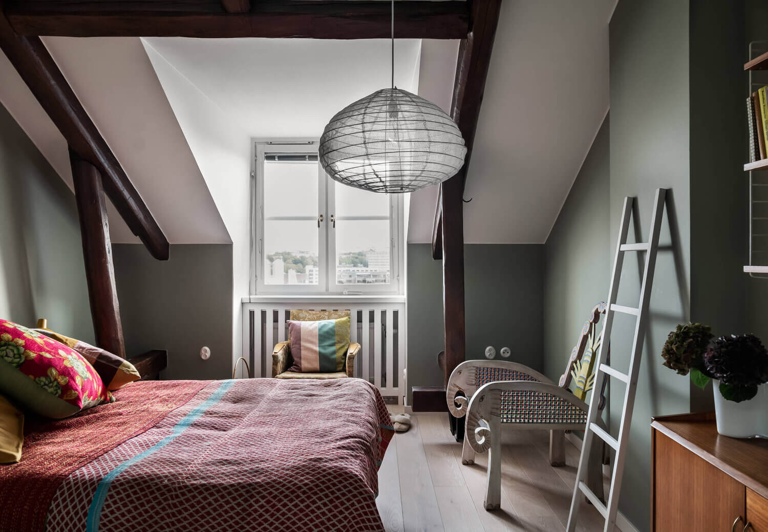 A Scandinavian Penthouse Apartment With A Dark Green Kitchen 11 green bedroom slanted ceiling scandinavian penthouse nordroom A Scandinavian Penthouse Apartment With A Dark Green Kitchen