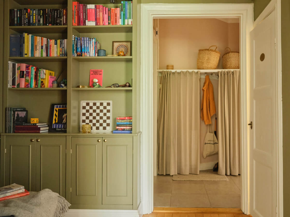 A Beautiful Color Palette and Historic Elements in a Stockholm Apartment 25 green built-in bookshelves