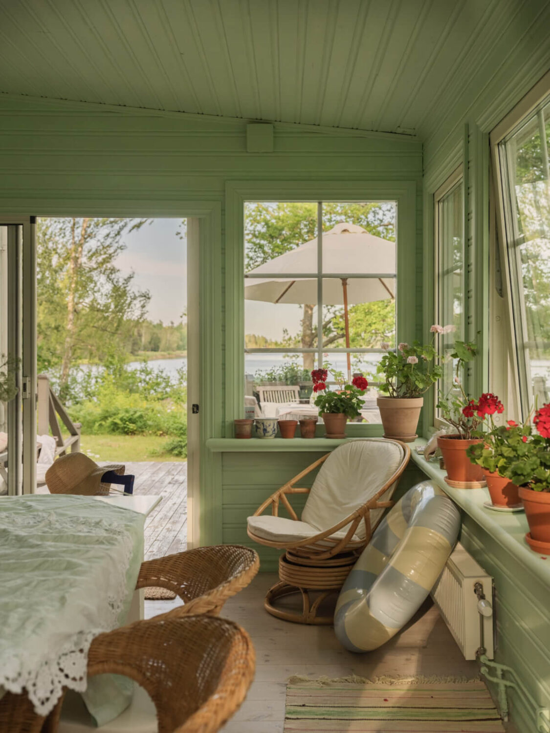 A 1930s Lakeside Country House with a Private Beach 4 green garden room