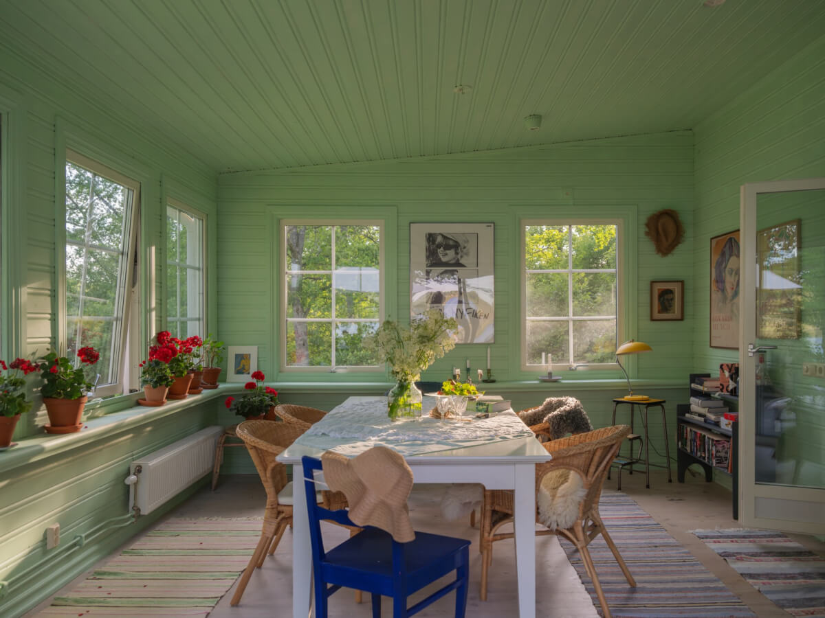 A 1930s Lakeside Country House with a Private Beach 7 green garden room lakeside home