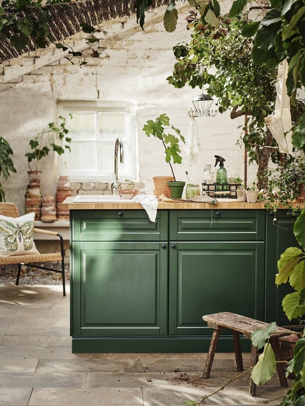 The Pros and Cons of a Wooden Kitchen Countertop 14 green-kitchen-island-ikea-plants-nordroom