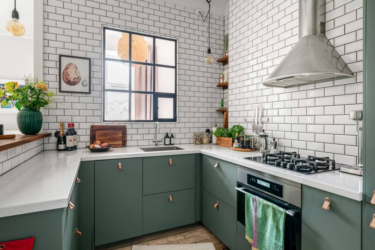 Behr Color of the Year 2026: Hidden Gem 15 green kitchen leather handles white subway tiles